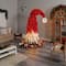 9ft. Pre-Lit Holiday Red Santa Hat Artificial Christmas Tree, White LED Lights